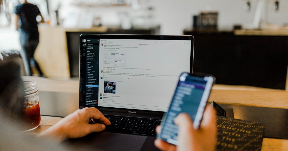 A freelance developer working from a laptop and phone