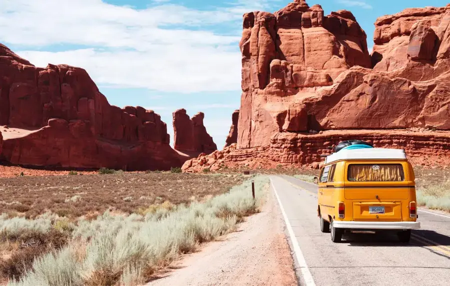 A bus moving through a canion