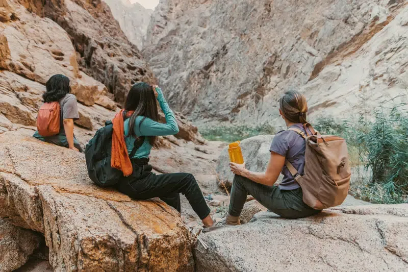 Women rest on hike